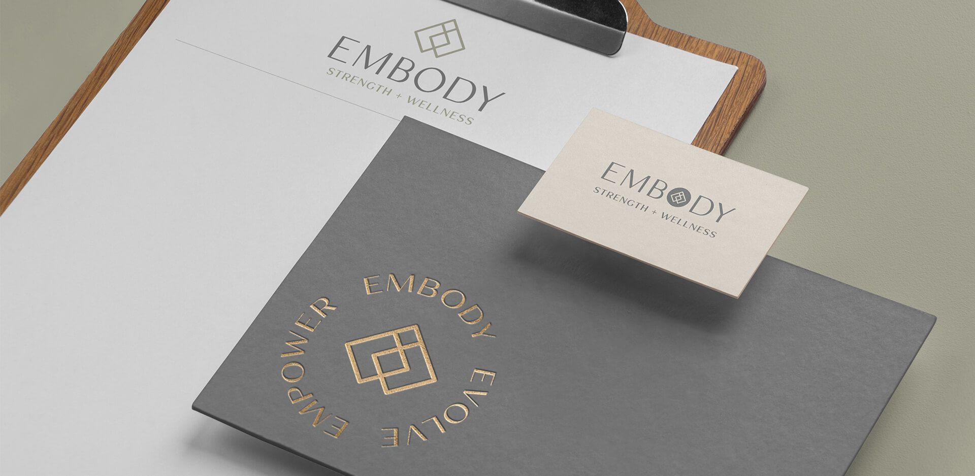 Stationary mockups for Embody Strength and Wellness