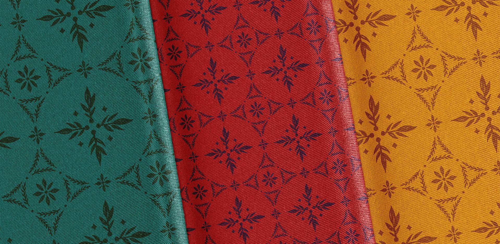 Three samples of fabric with the custom brand pattern for The Greener Gift