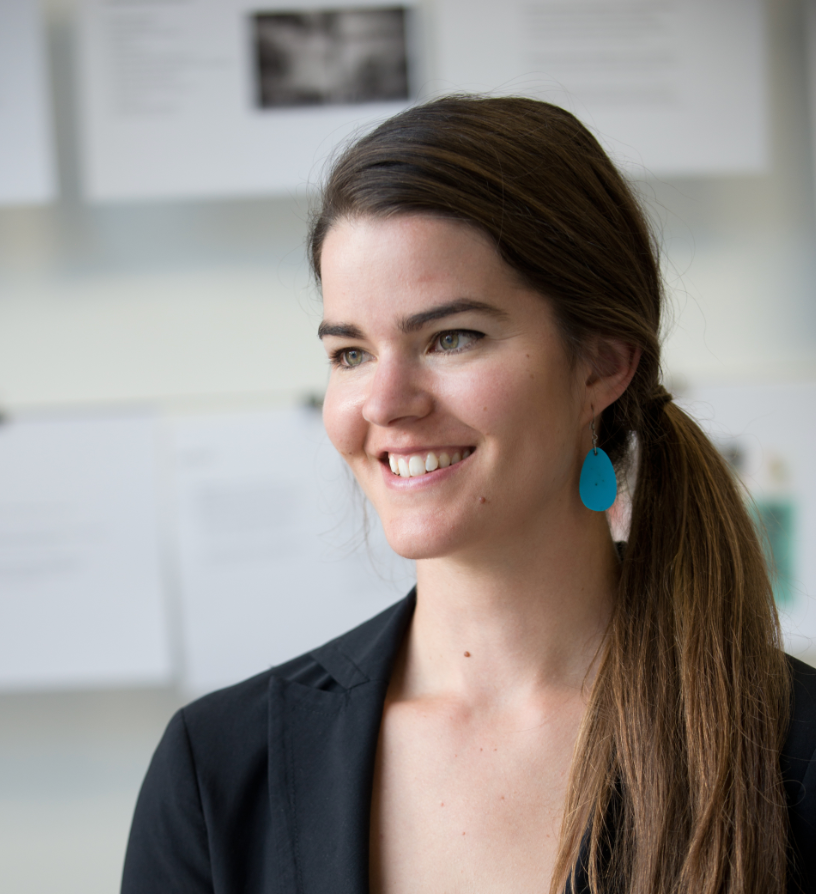 Smiling headshot of a Pacific Northwest, female agency owner.