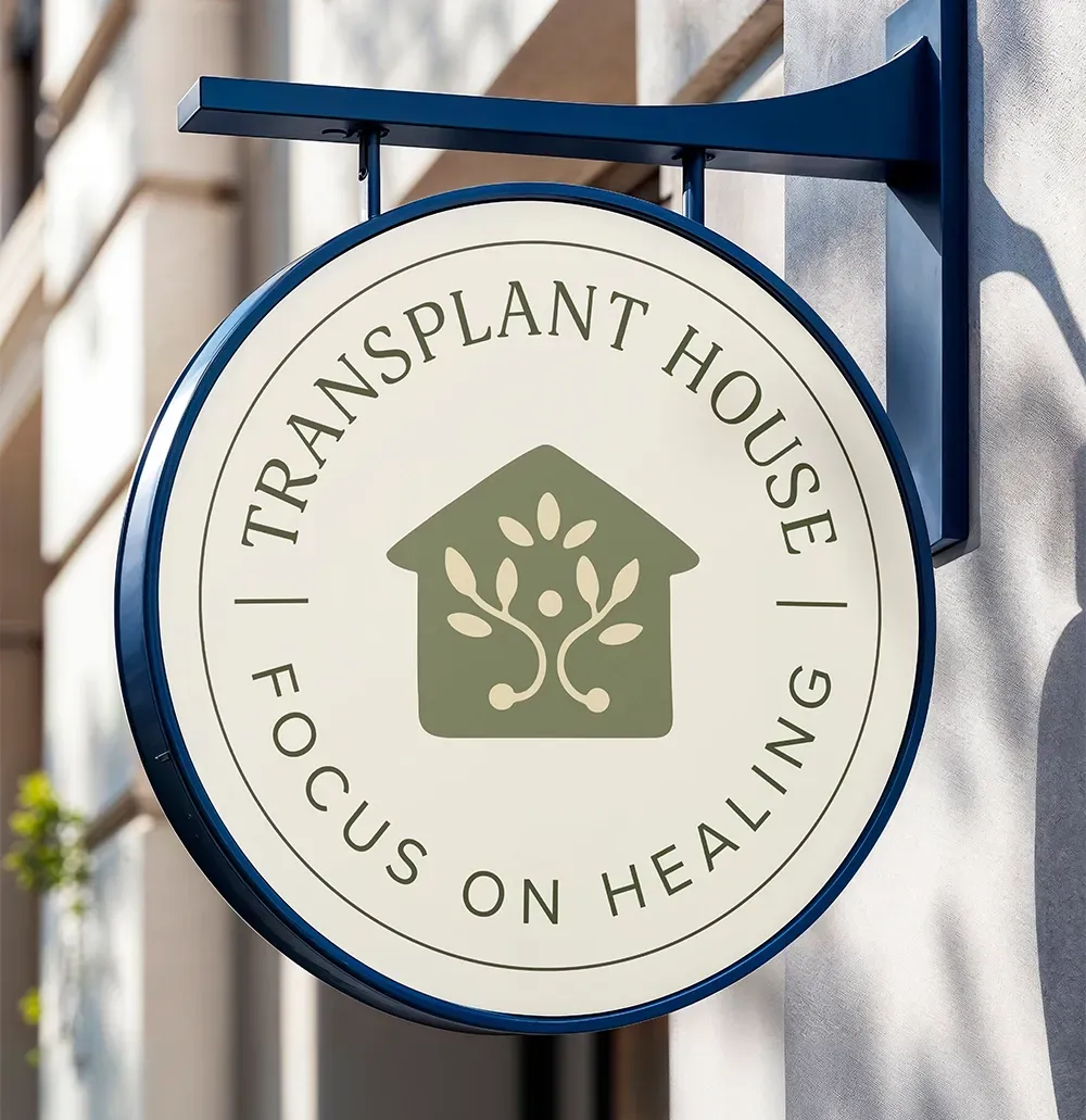 Outdoor signage for seattle nonprofit with refreshed logo design.