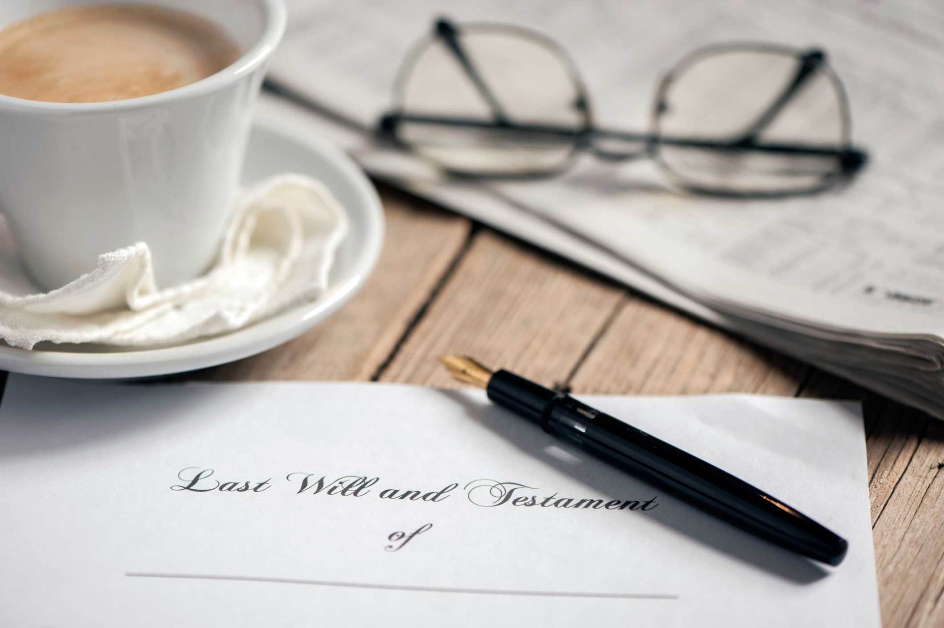 Cup of Coffee with a Last Will and Testament Document — Huntsville, AL — Elissa Green Attorney at Law