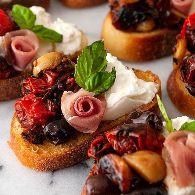 A close up of a sandwich with a rose on top