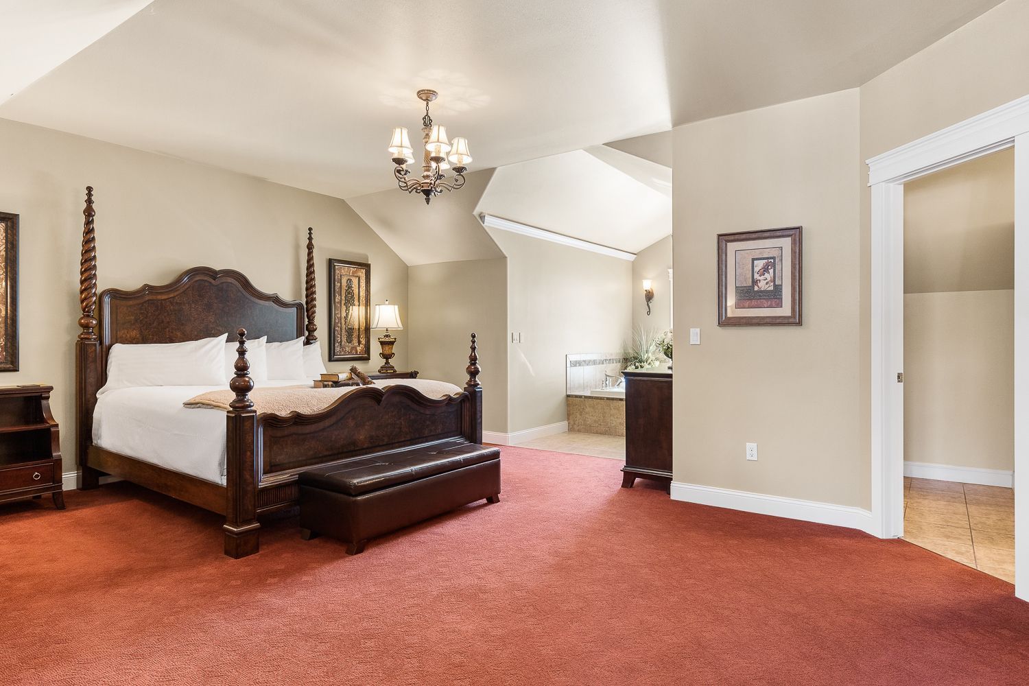 There is a large bed in the middle of the room.