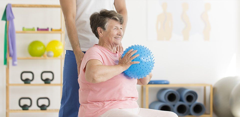 Elderly woman exercising