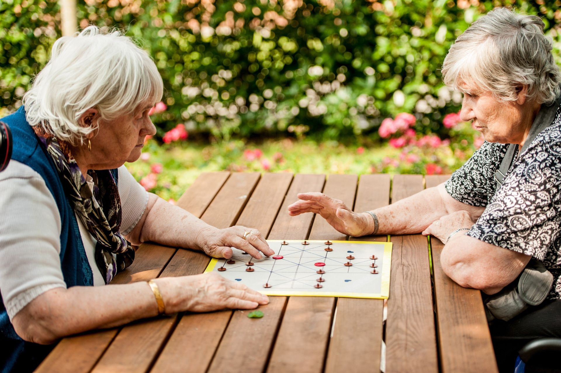 Avon Park Care Home Southampton residents playing board game