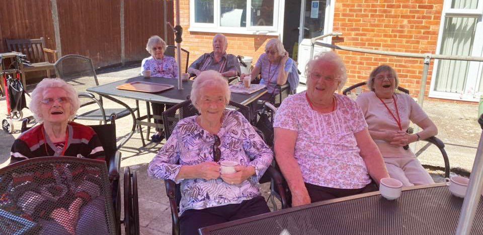 Residents in garden at Avon Park Care Home Southampton