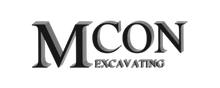 Logo for MCON Excavating in black and gray, with text “MCON” above “EXCAVATING”.