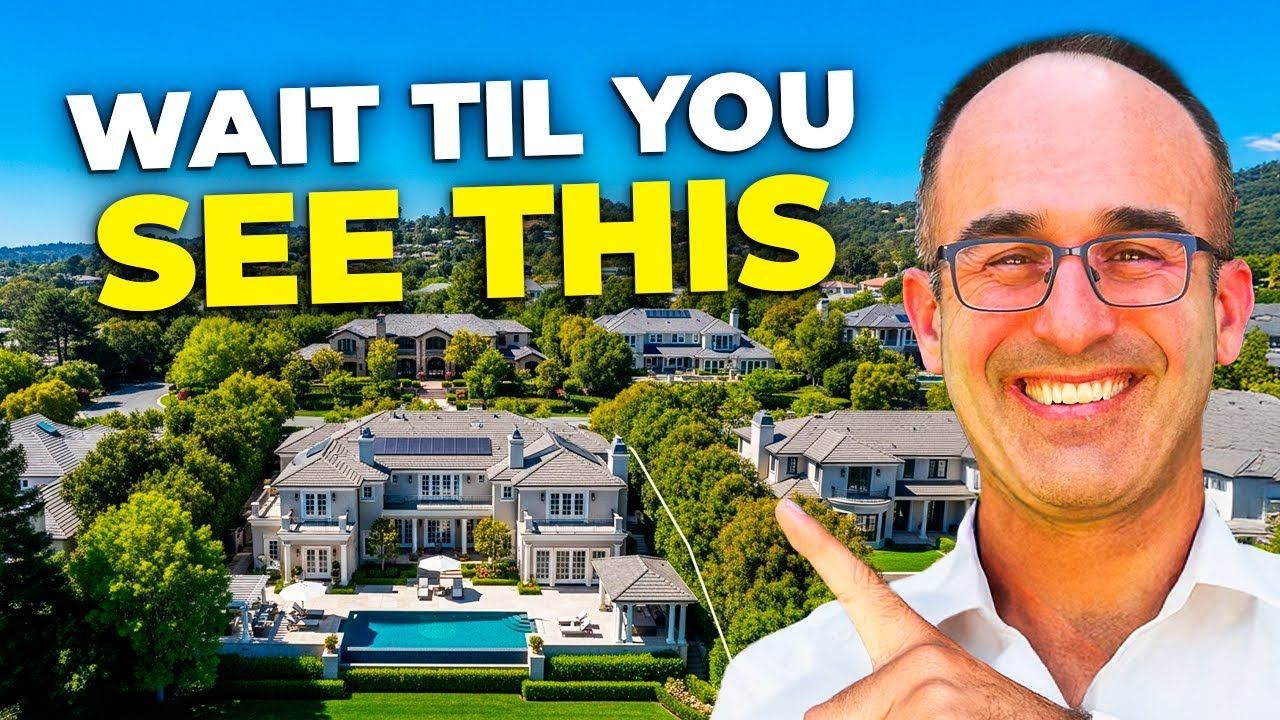 Man pointing at luxury homes, with 
