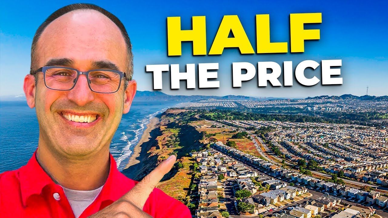 Smiling man points at a coastal cityscape with text: