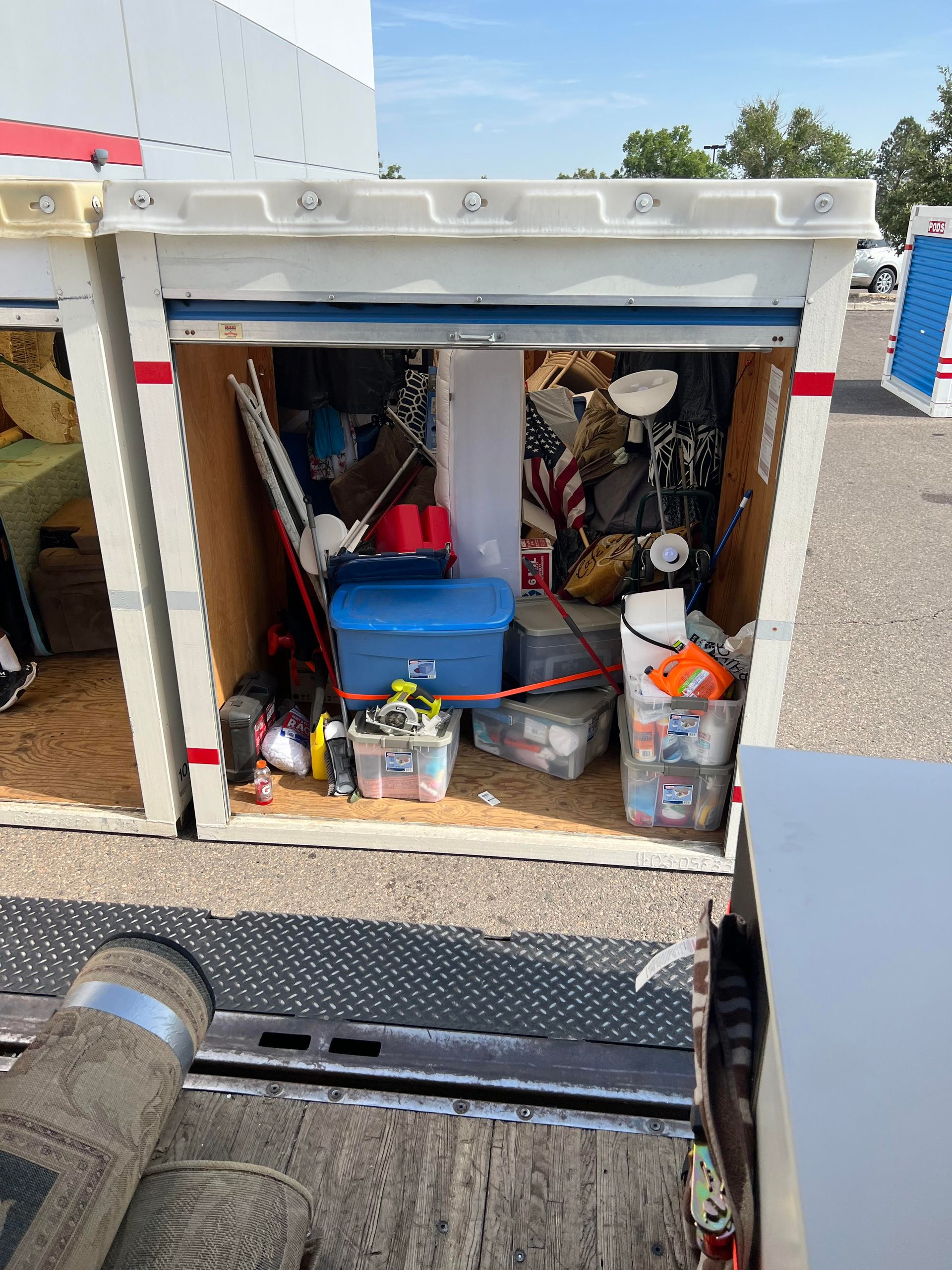 The inside of a storage container filled with lots of items.