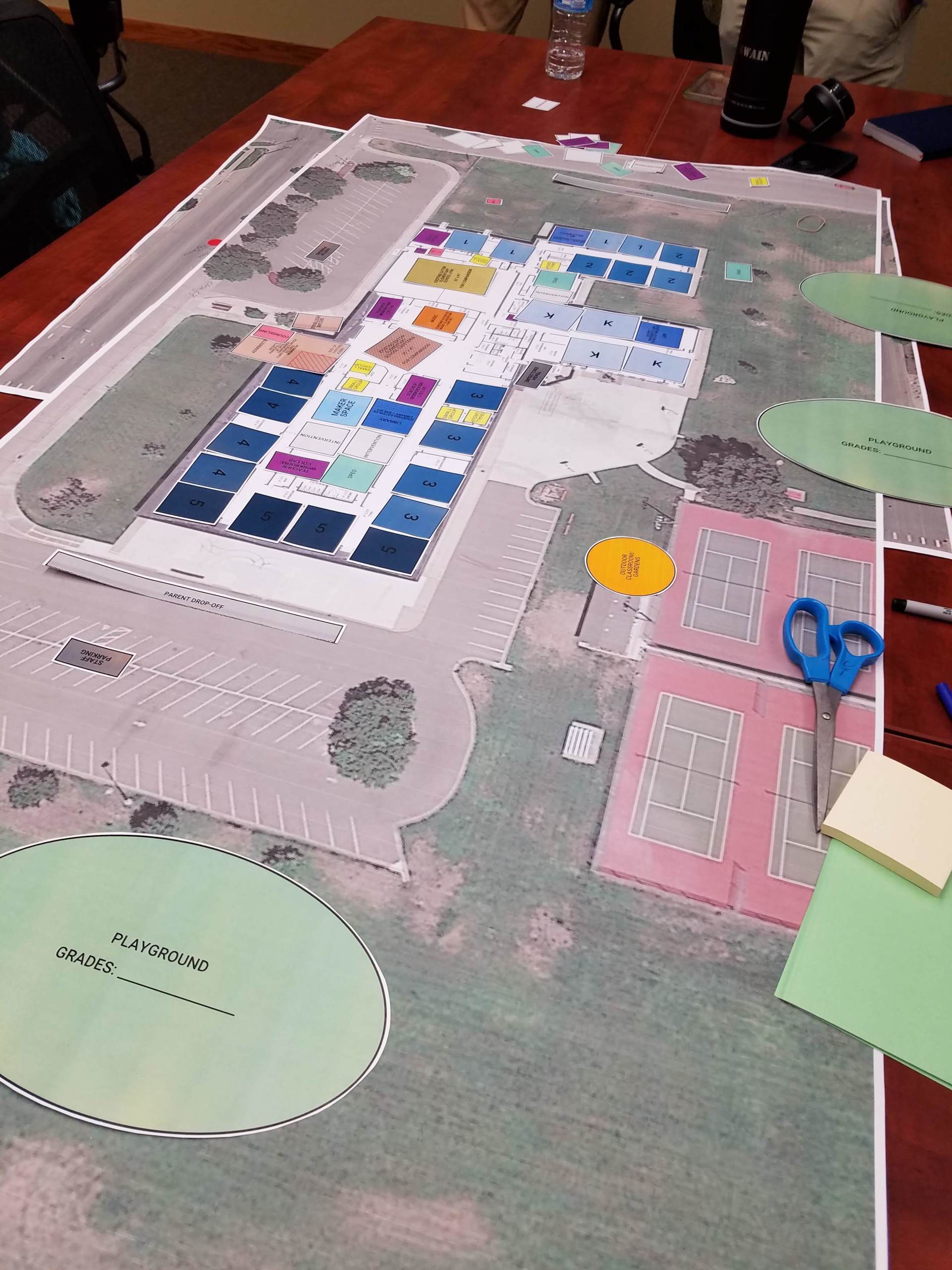 A table with a map on it that says no parking