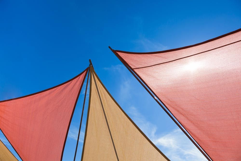 Red And Gold Triangle And Shade Sails — Shade Sails in Murwillumbah, NSW
