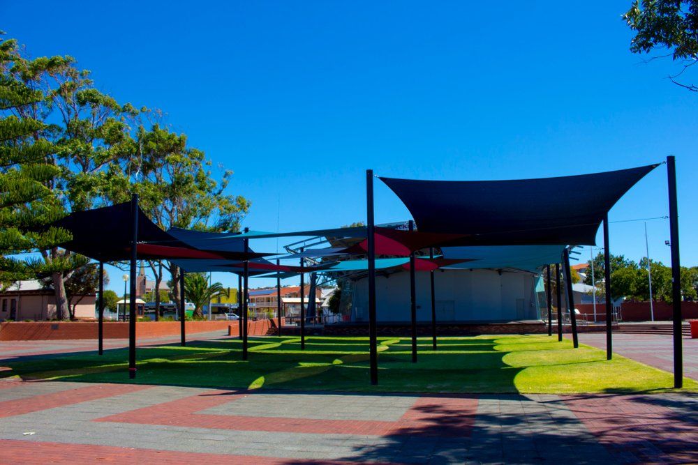 Red & Blue Shade Sails In Park — Shade Sails in Coffs Harbour, NSW