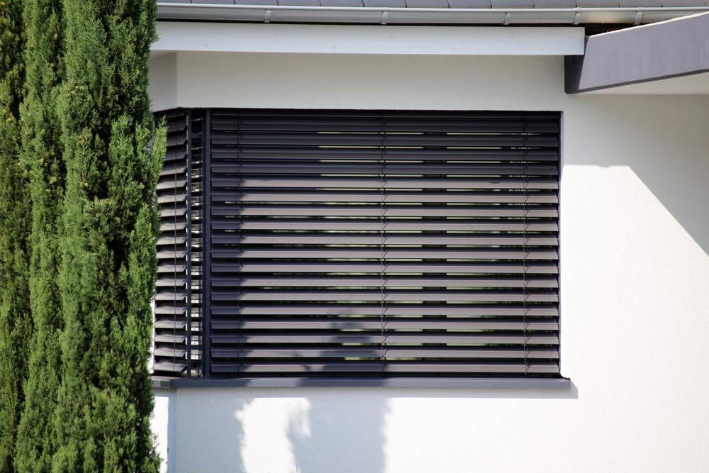 Window With Modern Blind In Exterior Home — Shade Sails in Byron Bay, NSW