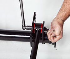 person holding a piece of metal in their hand