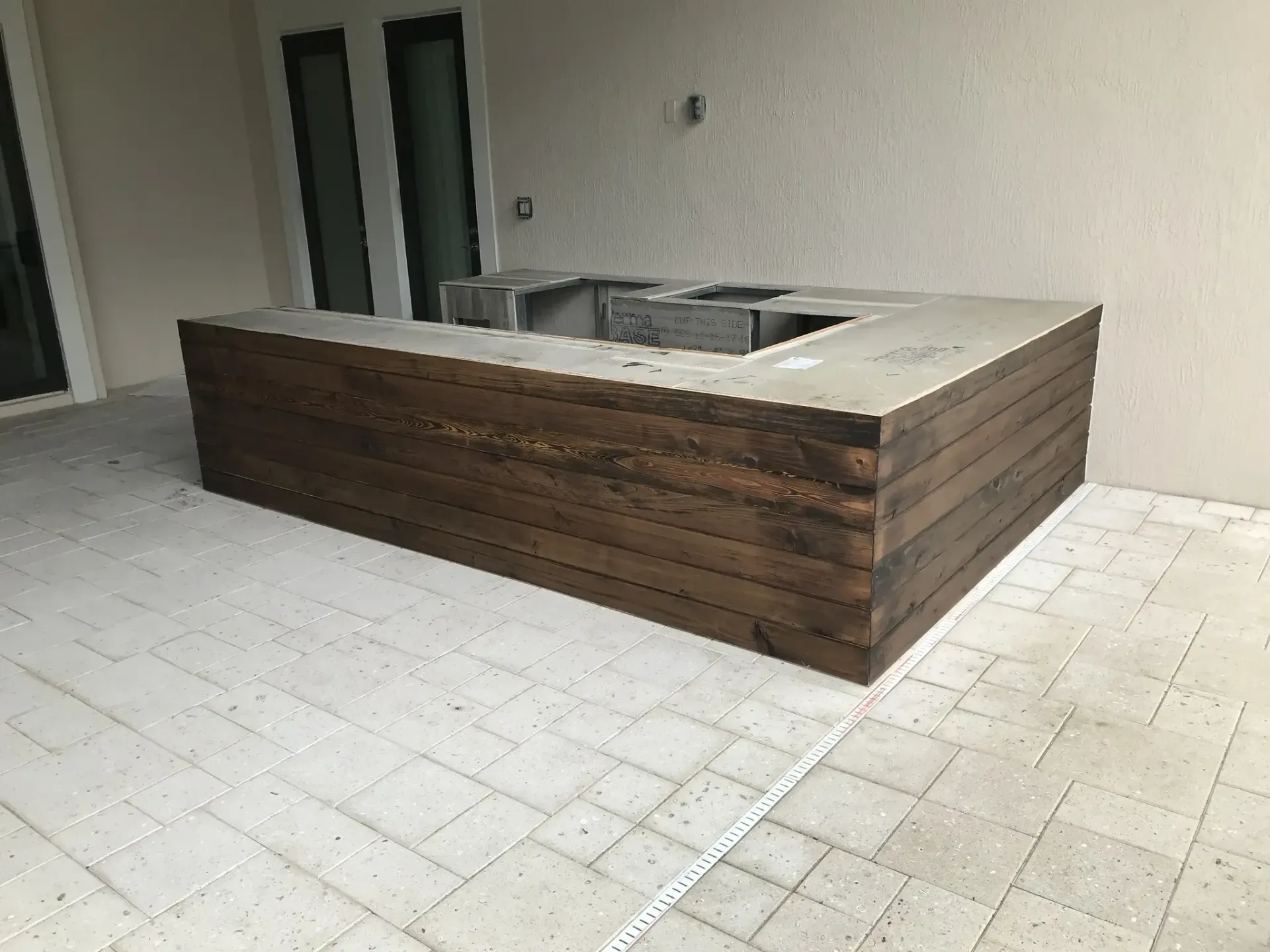 Custom outdoor bar in Lighthouse Point, FL by Carpentry Squad