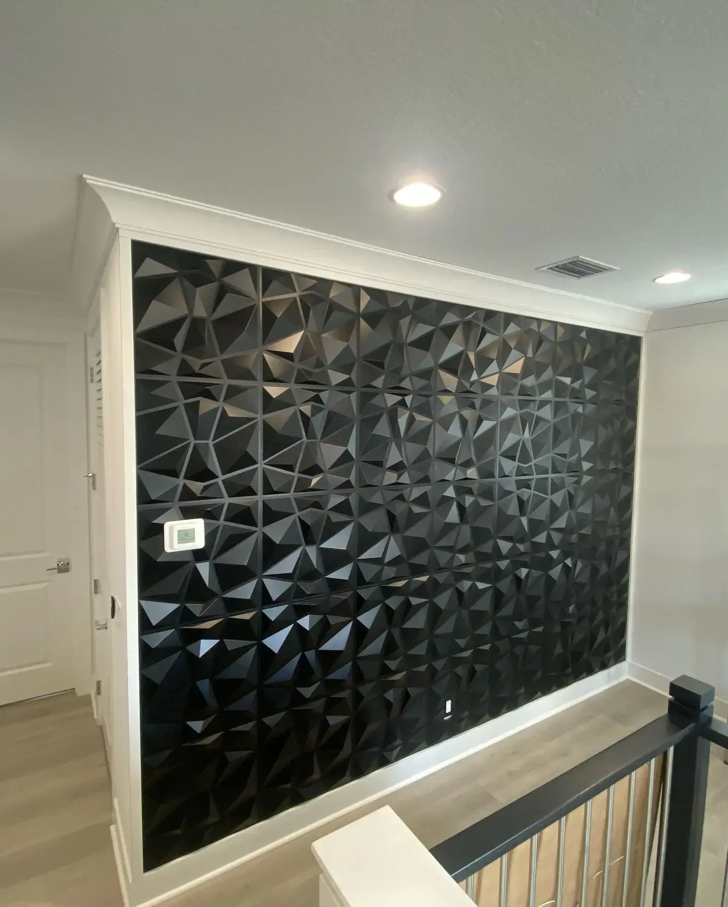 Textured wall with crown molding in Lighthouse Point, FL by Carpentry Squad