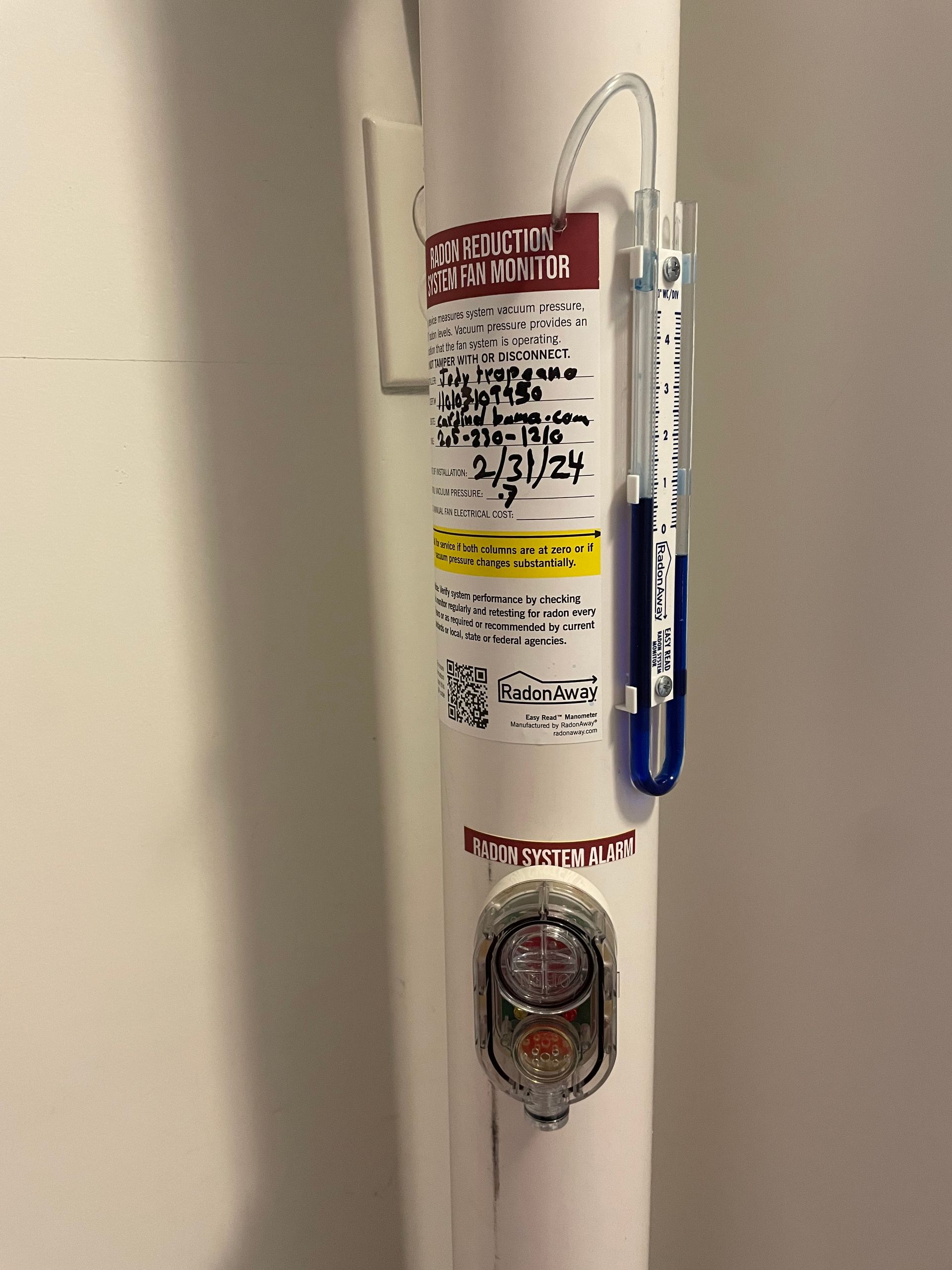 A White Water Heater with A Thermometer Attached to It | Birmingham, AL | Cardinal Construction