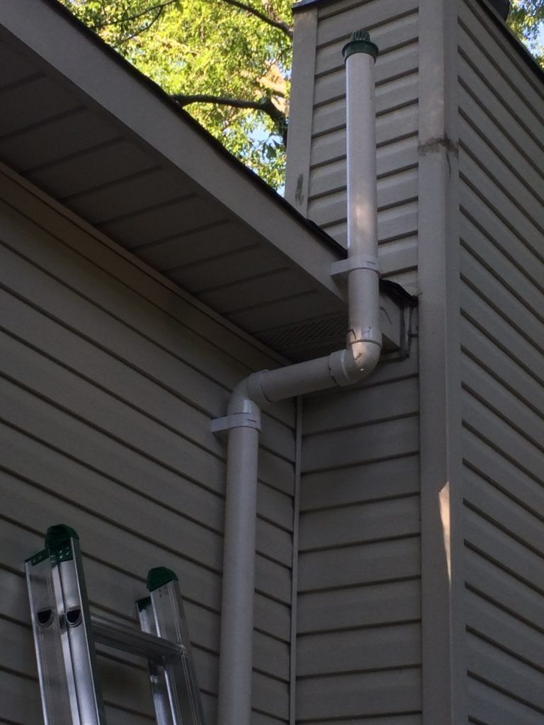 A White Pipe Is Attached to The Side of A House | Birmingham, AL | Cardinal Construction