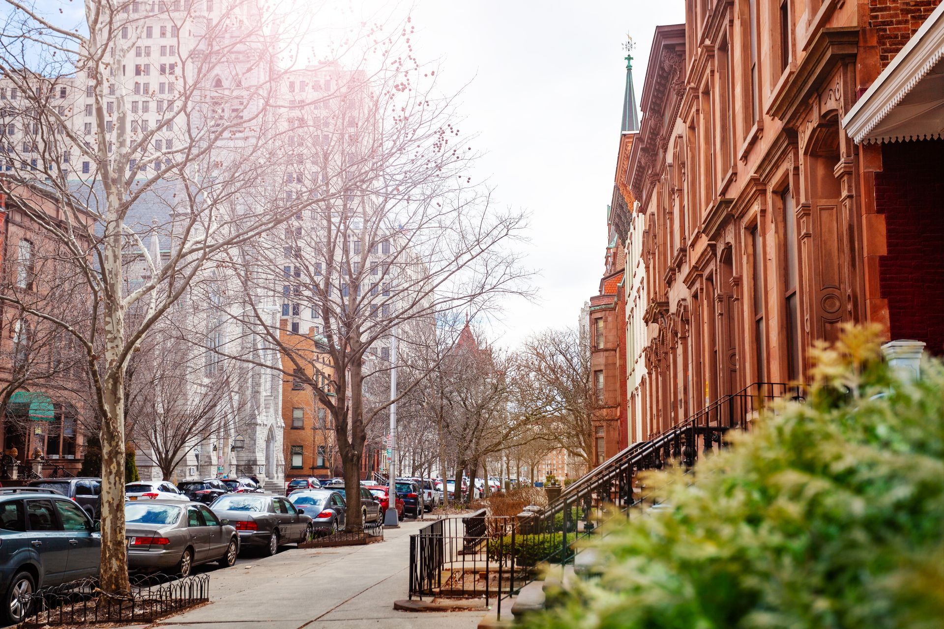 Photo of a street lined with apartment buildings