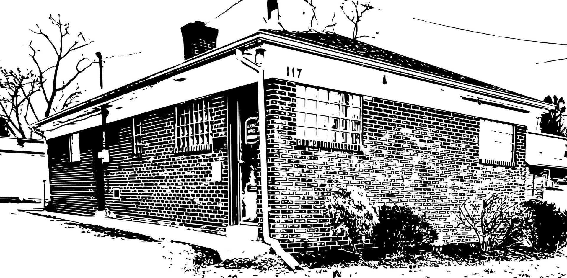 Black-and-white digital image of a brick office building