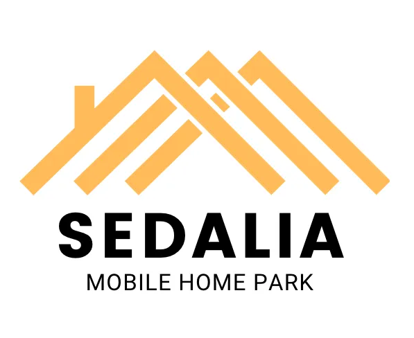 Logo for Sedalia Mobile Home Park, featuring overlapping yellow house roof outlines above black text.