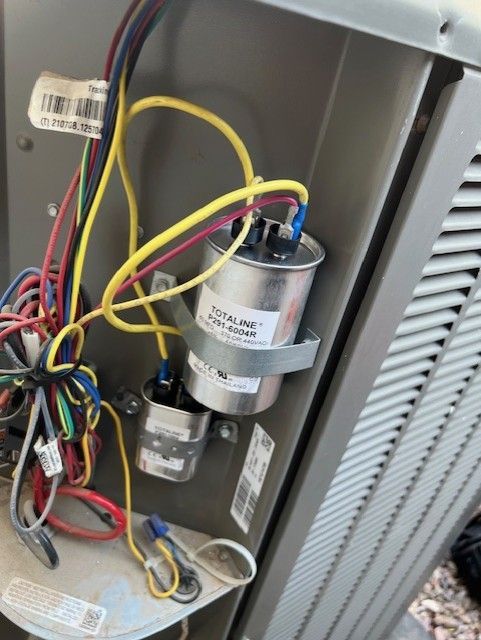 A bunch of wires are connected to a machine