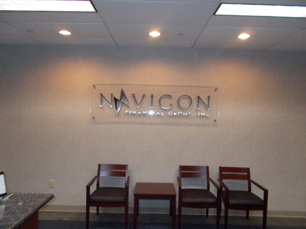 Waiting Room with Three Chairs and a Sign that Says Navicon — Virginia Beach, VA — Cardinal Sign Corporation