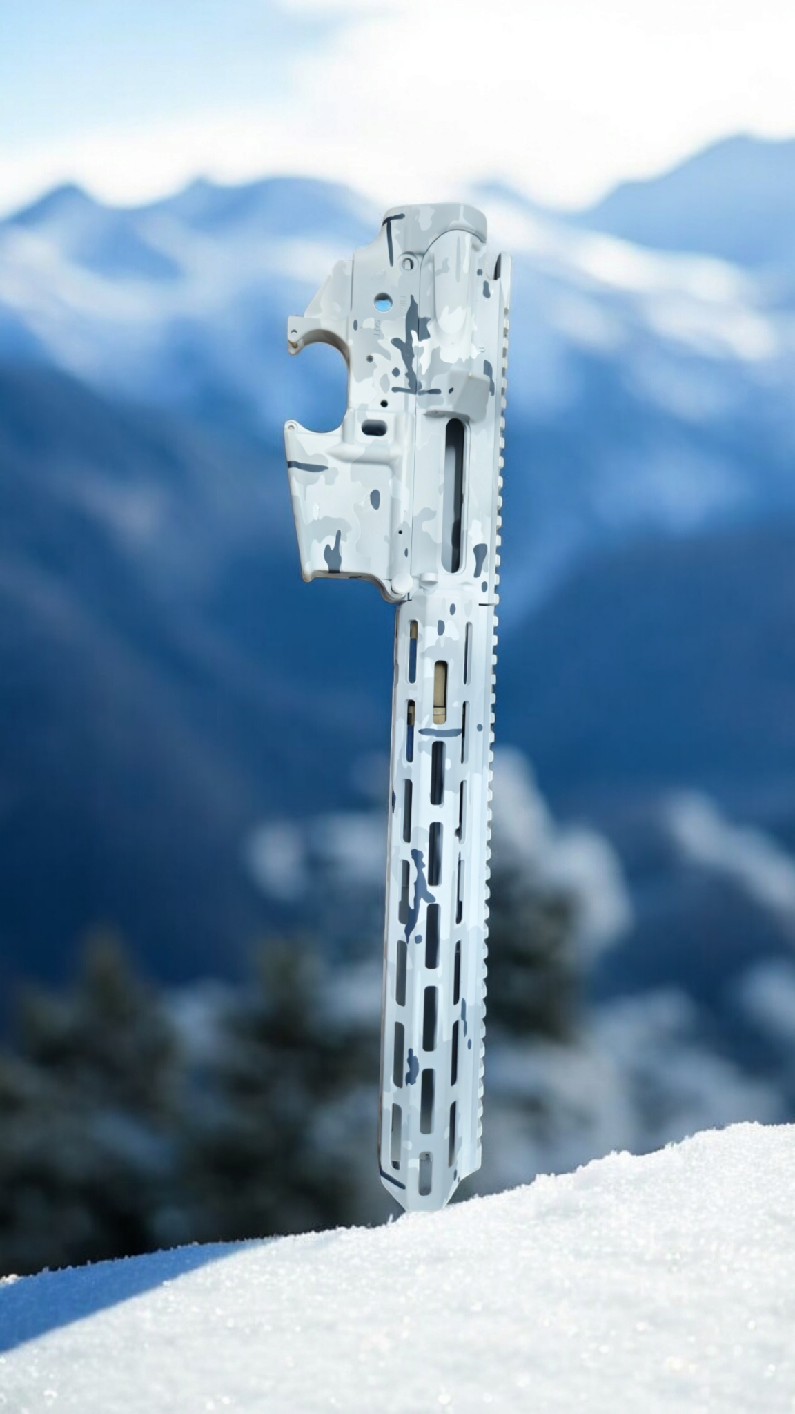 A white object is sitting on top of a snow covered mountain.