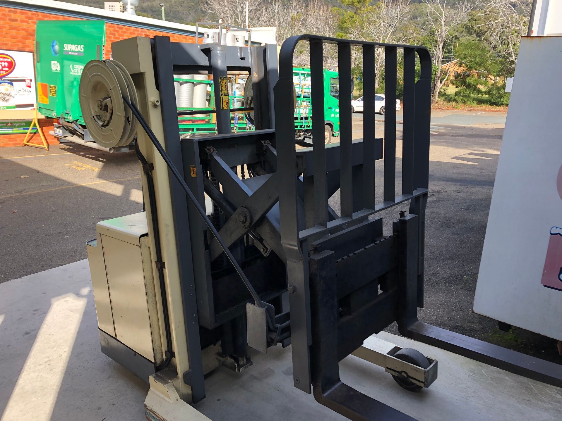 A white and black manual forklift— AAA Equipment Pty Ltd In Forster, NSW 