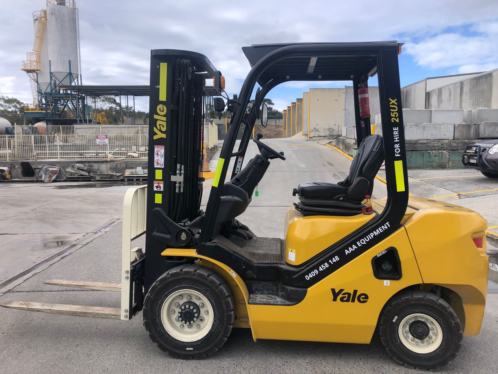 A Forklift Parked in A Yard — AAA Equipment Pty Ltd In Redbank, NSW
