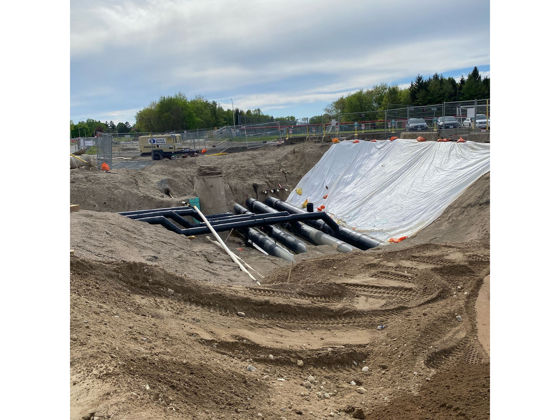 A large pile of dirt is sitting on top of a dirt field.