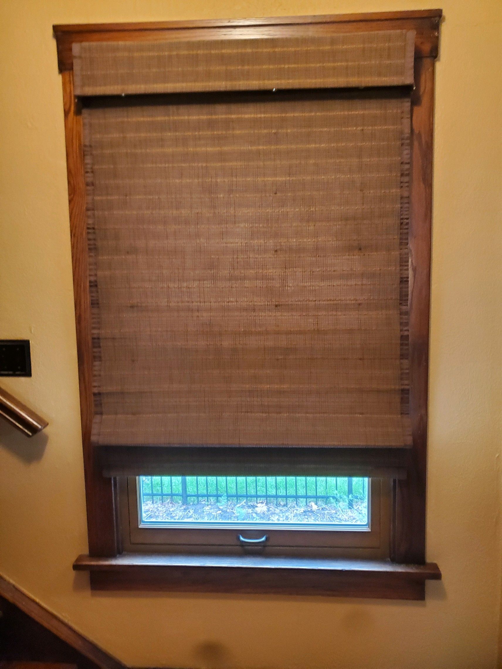 A window with a blind on it and a staircase in the background  — East Peoria, IL — Blinds For Less