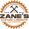 Logo for Zane's Custom Cabinets. Saw blade, crossed hammers, and text on brown background.