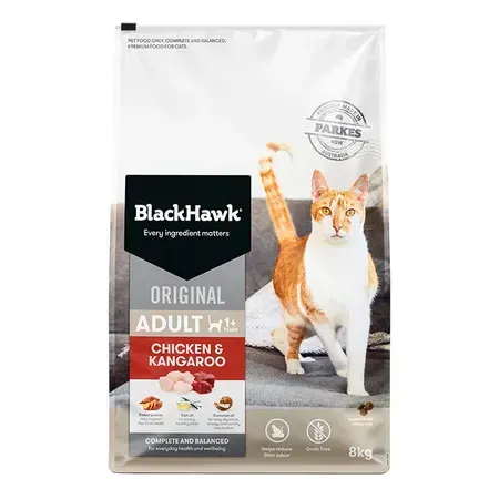 A bag of Black Hawk Original Adult cat food featuring a ginger and white cat in front of a sofa. The bag is white with black and red text.