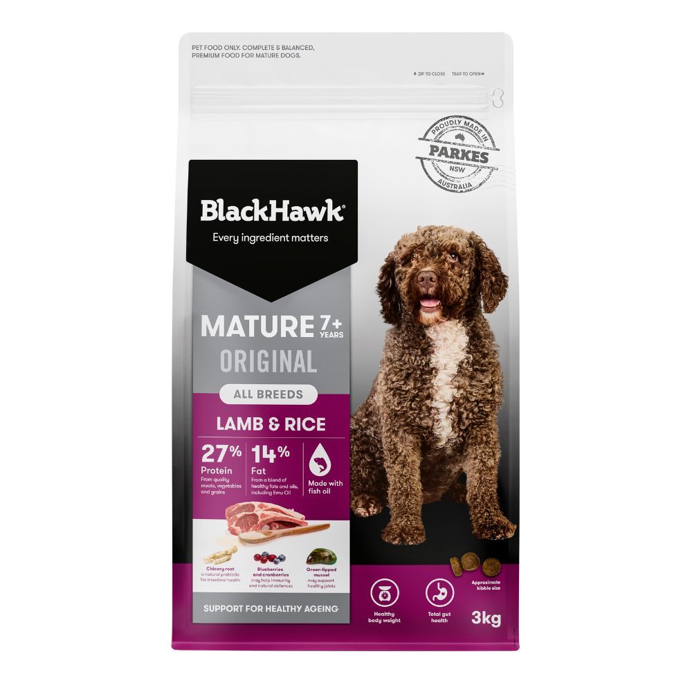 A bag of BlackHawk Mature 7+ Original Lamb & Rice dog food with a photo of a brown dog.