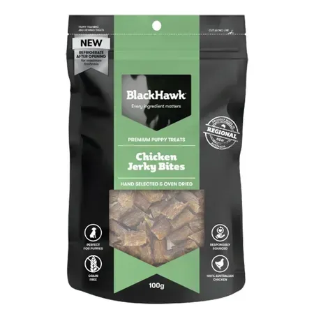 A black bag of BlackHawk Chicken Jerky Bites dog treats with a window showing the jerky.