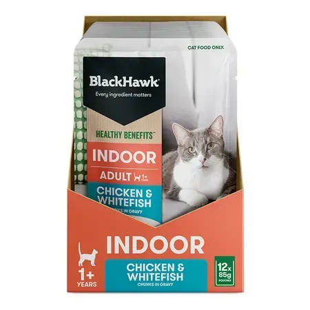 Box of Black Hawk Indoor cat food. The packaging is orange and white with a picture of a cat on it.