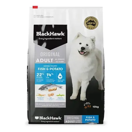 A bag of Black Hawk Original Adult Fish & Potato dog food, featuring a white Samoyed dog. The bag shows nutritional information and is labeled "Australian Made."