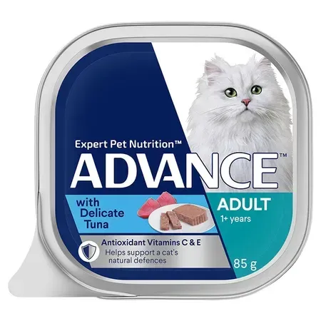 A cat food container with a white cat, blue and green labeling, and the text "ADVANCE Adult with Delicate Tuna."