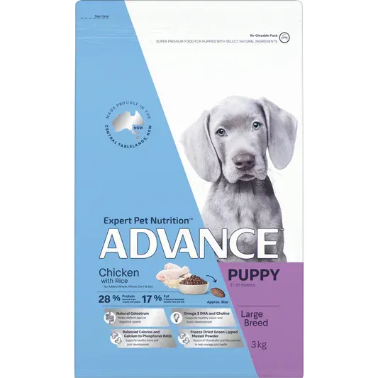 A bag of Advance puppy food with a Weimaraner puppy, chicken, and rice illustrations. Blue and white packaging.