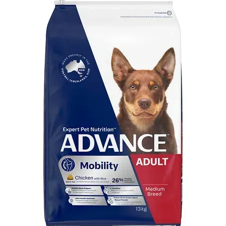 A bag of Advance Mobility Adult dog food, featuring a brown dog with upright ears. The bag is white and navy blue.