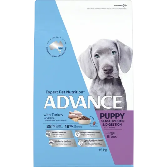 A bag of Advance Puppy Sensitive Skin & Digestion dry dog food with a puppy on the packaging. The bag is blue, white, and purple.
