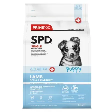 Bag of Prime100 SPD air-dried puppy food; lamb, apple, and blueberry flavor, with a puppy on the front.