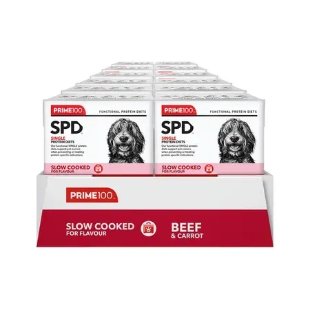 Display of Prime100 SPD dog food in Beef & Carrot flavor, featuring multiple white boxes with a dog's image and red accents.