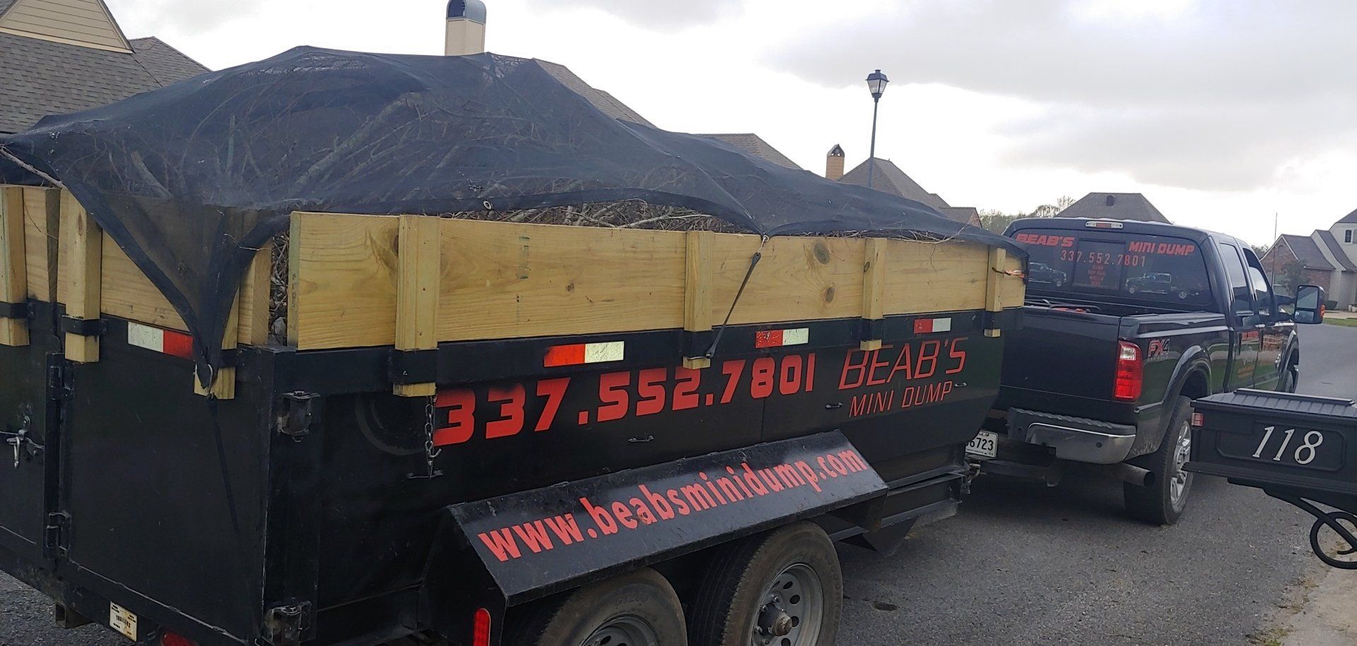 Debris On Mini Dump Truck