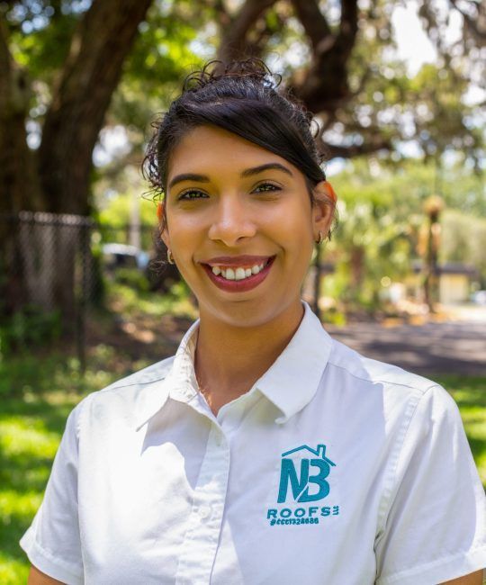 Yami Rodriguez, our team, wearing a white shirt with the letter nb on it