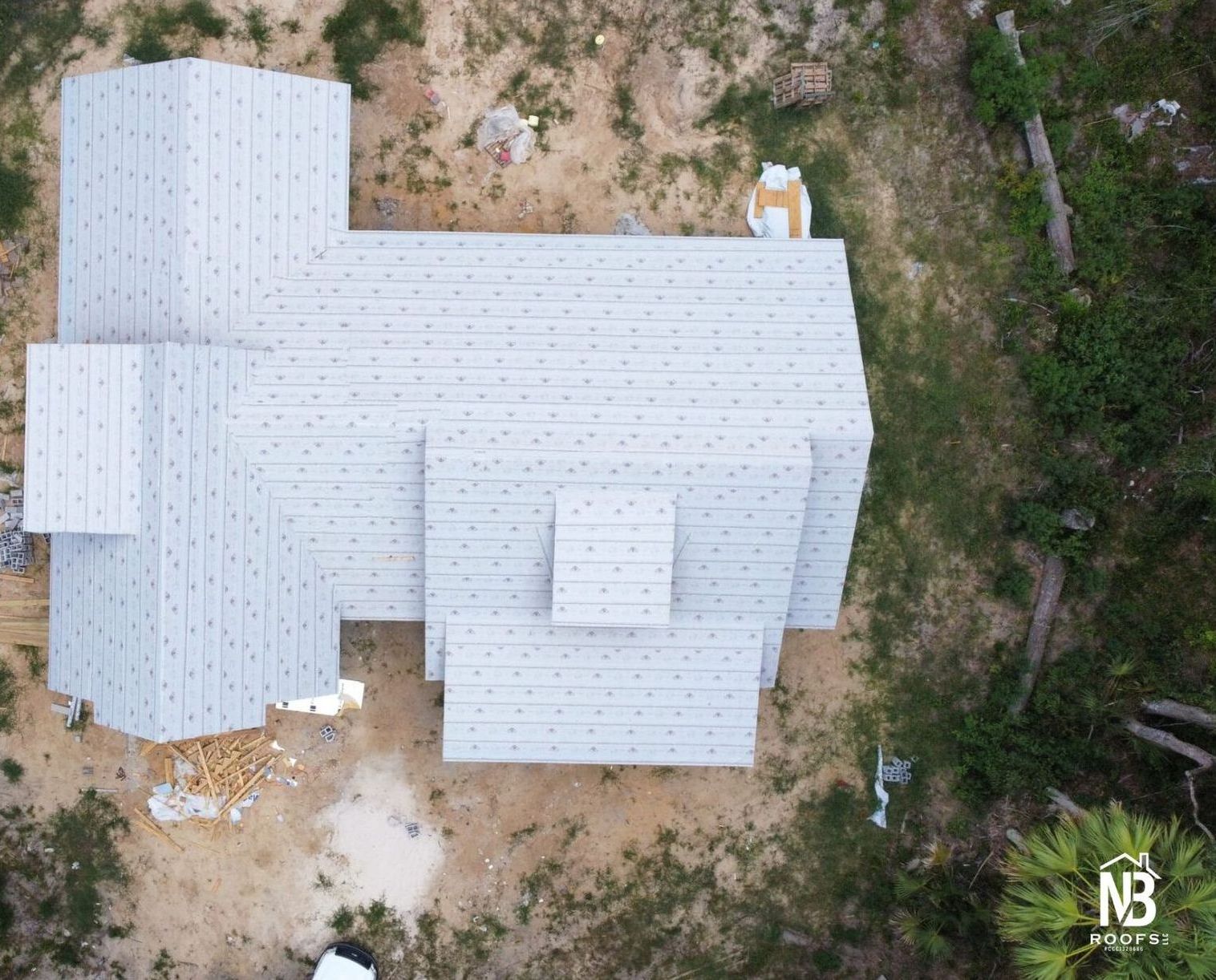 Aerial view of a house displaying newly repaired roof in The Villages