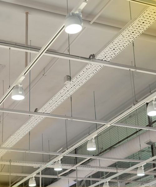 A ceiling with a lot of lights hanging from it