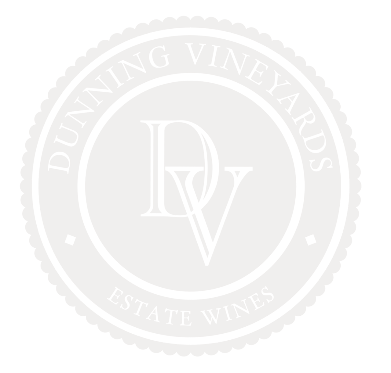 A white logo for dunning vineyards estate wines.